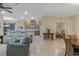 Bright, open living space flows into the kitchen and a versatile sitting room with comfortable seating at 2712 Arugula Dr, North Port, FL 34289