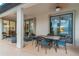 Relaxing screened-in patio with ceiling fans, comfortable seating, and glass doors at 2712 Arugula Dr, North Port, FL 34289