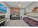 Inviting bedroom offers a mounted TV and comfortable sleeping space at 27896 Arrowhead Cir, Punta Gorda, FL 33982