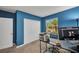 Blue office space with ample storage and natural light at 27896 Arrowhead Cir, Punta Gorda, FL 33982