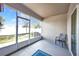 Enclosed patio with a neutral color scheme, ideal for relaxing and entertaining at 27896 Arrowhead Cir, Punta Gorda, FL 33982