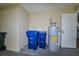 Utility room featuring water heater, and space for a washer and dryer at 3085 Arrowhead Rd, Venice, FL 34293