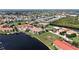 Stunning aerial view of waterfront condos with private docks and lush landscaping in a beautiful coastal community at 3308 Purple Martin Dr # 121, Punta Gorda, FL 33950