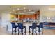 Well-equipped kitchen features a breakfast bar, granite countertops, and stainless steel appliances at 3308 Purple Martin Dr # 121, Punta Gorda, FL 33950