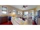 Inviting living room featuring hardwood floors, lots of natural light, and comfortable seating at 3308 Purple Martin Dr # 121, Punta Gorda, FL 33950