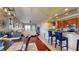 Spacious, open-concept living area with kitchen, dining area, and a sliding door to a deck at 3308 Purple Martin Dr # 121, Punta Gorda, FL 33950