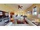 Spacious living room with hardwood floors, flows into the kitchen and dining area, ideal for entertaining at 3308 Purple Martin Dr # 121, Punta Gorda, FL 33950