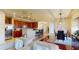 Open-concept living space with modern kitchen, dining area, and living room, great for gatherings at 3308 Purple Martin Dr # 121, Punta Gorda, FL 33950