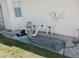 Pool equipment area featuring pump and filter, situated on a concrete pad with utility connections at 388 Orlando Blvd, Port Charlotte, FL 33954