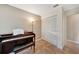 Small office showcases a piano, closet and tile flooring at 4062 Blitzen Ter, North Port, FL 34287