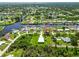 Stunning aerial view of a waterfront community, showcasing the canals and beautiful homes at 4123 Rock Creek Dr, Port Charlotte, FL 33948