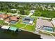 A waterfront property with a private dock and pool in a lush, residential neighborhood at 4123 Rock Creek Dr, Port Charlotte, FL 33948