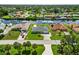 Waterfront homes line the canal with boat lifts for easy access to the open water at 4123 Rock Creek Dr, Port Charlotte, FL 33948