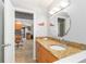Bathroom featuring granite countertop, modern fixtures, and tile flooring at 4123 Rock Creek Dr, Port Charlotte, FL 33948