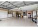 Spacious garage with laundry hookups, storage, and a sturdy epoxy floor at 4123 Rock Creek Dr, Port Charlotte, FL 33948