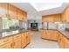 Open kitchen layout with granite countertops and easy access to the living room at 4123 Rock Creek Dr, Port Charlotte, FL 33948