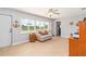 Bright living room with large windows offering water views and tile flooring at 4123 Rock Creek Dr, Port Charlotte, FL 33948