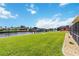 Beautiful waterfront property with lush green lawn and canal views, perfect for Florida living at 4123 Rock Creek Dr, Port Charlotte, FL 33948