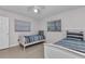 Bedroom showcasing neutral walls, two twin beds, and two windows at 4244 Harbor Blvd, Port Charlotte, FL 33952