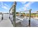 Dock and boat lift create a serene waterfront setting with convenience for boat owners at 4244 Harbor Blvd, Port Charlotte, FL 33952