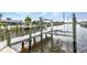 A sturdy boat lift attached to a private dock offers convenience for water activities at 4244 Harbor Blvd, Port Charlotte, FL 33952