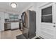 Modern kitchen with stainless steel appliances, updated cabinets, and a bright, airy feel at 4244 Harbor Blvd, Port Charlotte, FL 33952