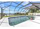 View of canal from the screen enclosed pool at 4244 Harbor Blvd, Port Charlotte, FL 33952