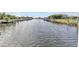 Beautiful waterfront view of the canal, with docks and homes visible on either side at 4244 Harbor Blvd, Port Charlotte, FL 33952