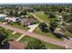 Wide aerial view of community near highway, water, and neighborhood amenities at 437 South Dr, Punta Gorda, FL 33950