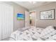 Bedroom features a ceiling fan, flat screen TV and closet at 437 South Dr, Punta Gorda, FL 33950