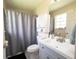 This bathroom includes a shower-tub combo and an updated vanity at 477 Ricold Ter, Port Charlotte, FL 33954