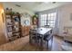Charming dining area with hardwood floors, stylish decor, and ample natural light at 477 Ricold Ter, Port Charlotte, FL 33954