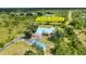 Gorgeous home with a metal roof, and a large lot that includes a riding trail in Prairie Creek Park at 5950 Cypress Grove Cir, Punta Gorda, FL 33982