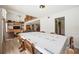 Open-concept dining room showcasing a spacious layout and access to the second floor at 5950 Cypress Grove Cir, Punta Gorda, FL 33982