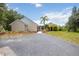 Charming single-story home with a light-colored exterior and manicured landscaping at 5950 Cypress Grove Cir, Punta Gorda, FL 33982