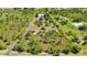 Property lines clearly demarcate the boundary of the property, highlighting its size and dimensions in an aerial shot at 5950 Cypress Grove Cir, Punta Gorda, FL 33982