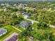An expansive property features this home's location and backyard pool from an elevated point of view at 6444 Alhambra Ave, North Port, FL 34291