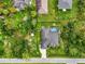 Aerial of the home, showing the roof, pool and surrounding landscaping at 6444 Alhambra Ave, North Port, FL 34291