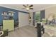 Spare bedroom with a neutral color palette, ceiling fan, closet, and window views at 6444 Alhambra Ave, North Port, FL 34291