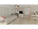 Bright bedroom with a large window, closet, ceiling fan, and neutral-colored walls at 6444 Alhambra Ave, North Port, FL 34291