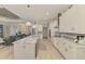 Spacious kitchen with a large island, modern appliances, and an open layout to the living areas at 6444 Alhambra Ave, North Port, FL 34291