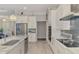 Well-equipped kitchen featuring stainless steel appliances, granite countertops, and ample cabinet space at 6444 Alhambra Ave, North Port, FL 34291