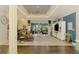 Spacious living room with modern decor and sliding glass doors to the lanai at 6444 Alhambra Ave, North Port, FL 34291