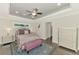 Cozy main bedroom with stylish furniture, soft lighting, and a comfortable layout at 6444 Alhambra Ave, North Port, FL 34291