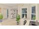 Stylish office space featuring natural light, a modern desk setup, and views of the home's decor at 6444 Alhambra Ave, North Port, FL 34291