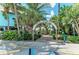Entrance to Venice Fishing Pier surrounded by lush vegetation at 12390 Wellen Golf St # 202, Venice, FL 34293