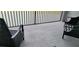 Relaxing outdoor patio with seating providing a comfortable space to enjoy the peaceful water views at 12390 Wellen Golf St # 202, Venice, FL 34293