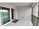 Inviting outdoor patio featuring screened enclosure with a beautiful view of natural surroundings at 12390 Wellen Golf St # 202, Venice, FL 34293