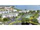 Condos with a pond, tennis court, boat docks, parking, and lush landscaping at 1250 W Marion Ave # 333, Punta Gorda, FL 33950