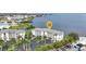 Waterfront condo complex, nestled amidst swaying palm trees, boasting scenic views and a convenient parking area at 1250 W Marion Ave # 333, Punta Gorda, FL 33950